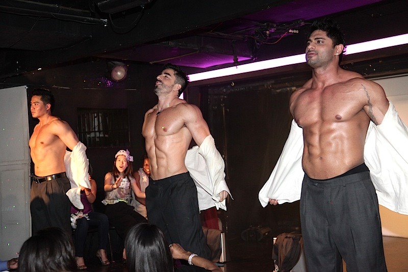 Exciting male dancer on stage at Hunk-O-Mania, NYC. Dynamic performance showcasing the vibrant and entertaining male revue show